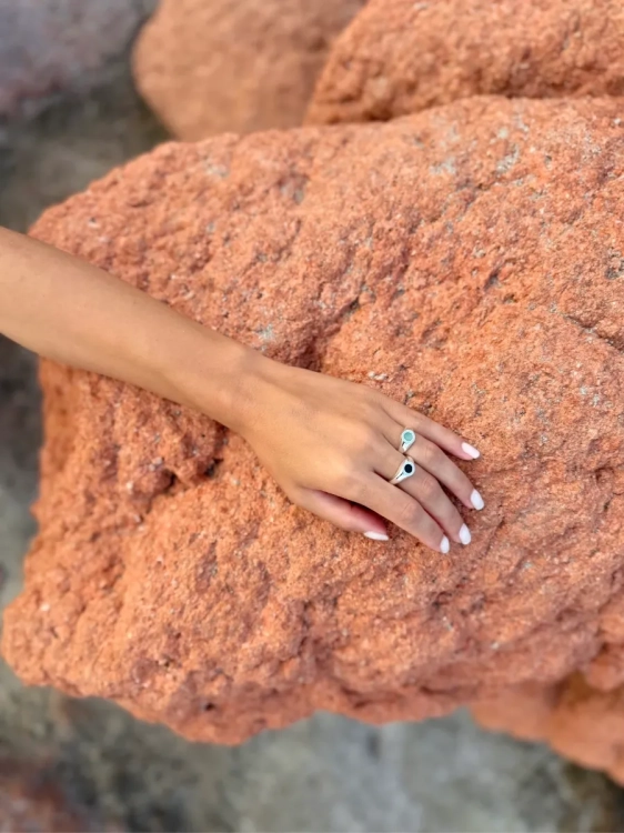 Sterling silver ring with black stone.