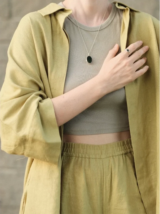 Women’s silver jewelry with nephrite gemstone.