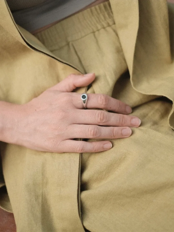 Elegant silver signet ring with deep green Polish nephrite as a modern accessory.