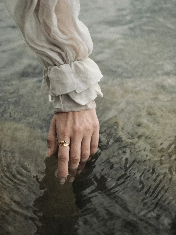 Adjustable gold-plated amber ring styled for everyday wear