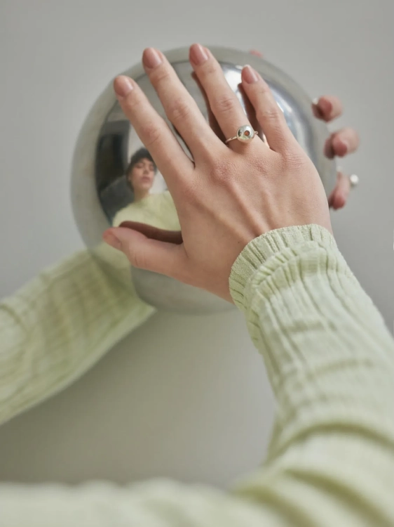 Modern sterling silver sphere ring with amber inlay