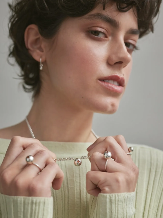 Contemporary sterling silver ring with Baltic amber accent