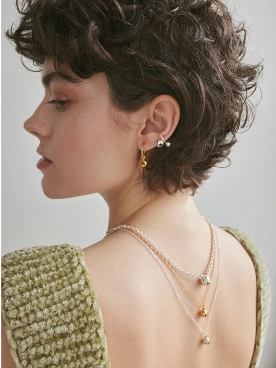 Sterling silver ear cuff with polished spheres and Baltic amber detail