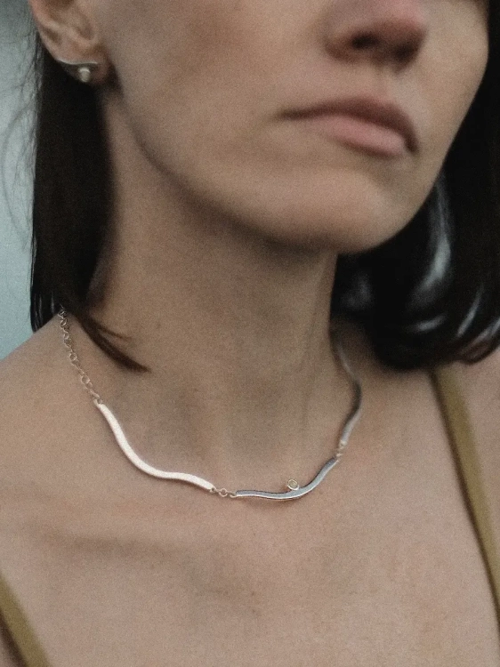 Sterling silver amber choker worn on the neck