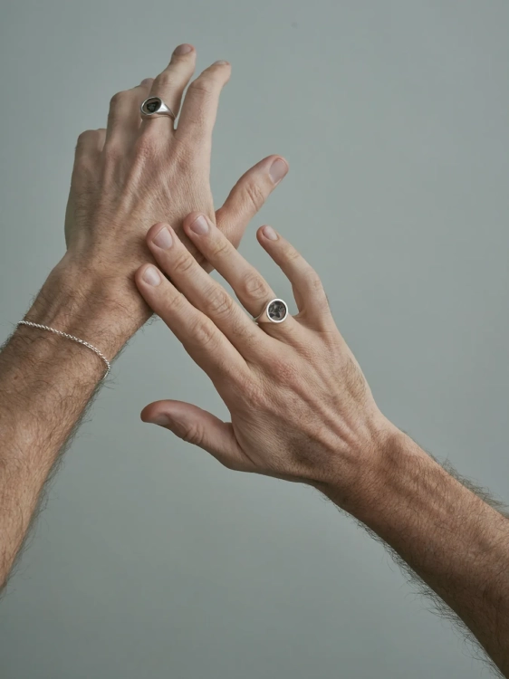 Sterling silver signet ring with meteorite as a unique statement piece