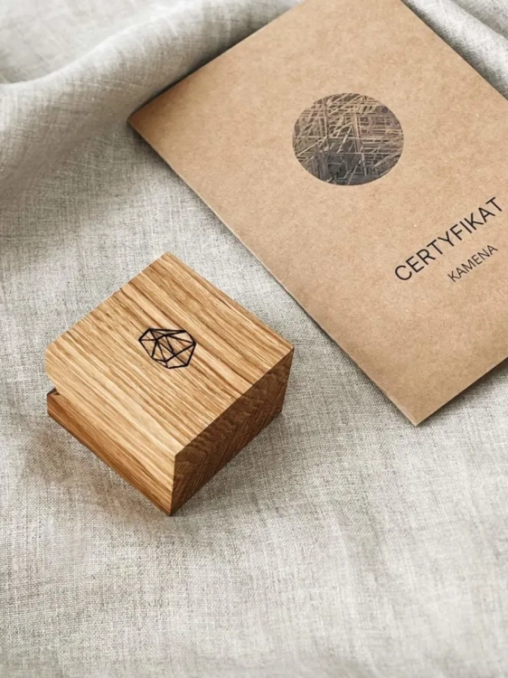 Elegant wooden jewelry box used for packaging the gold meteorite ring, ideal for gifting.