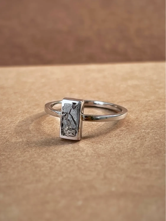 Elegant silver ring with meteorite fragment