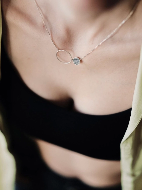 Sterling silver necklace with grey stone pendant