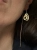 Hanging earrings with openwork pendant