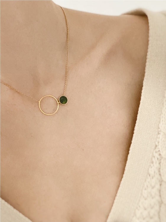 Minimalist gold circle necklace with green nephrite stone