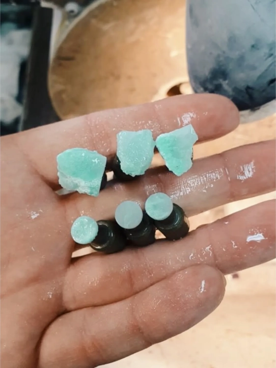 Hand cutting chrysoprase from Lower Silesia into jewelry cabochons