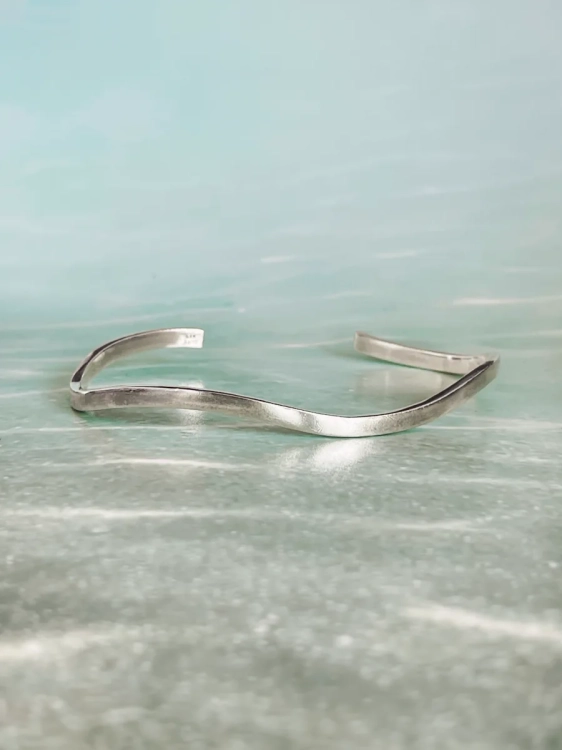 Wave-inspired sterling silver bracelet, close-up detail