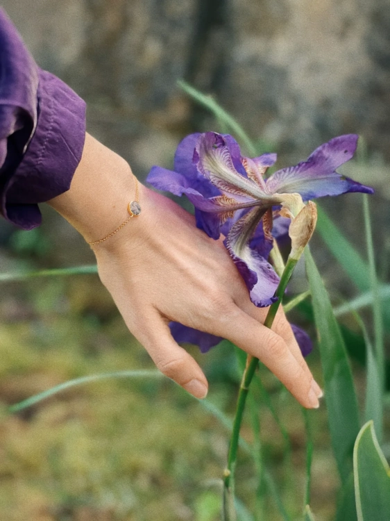 Minimalist gold bracelet with soft pink gemstone