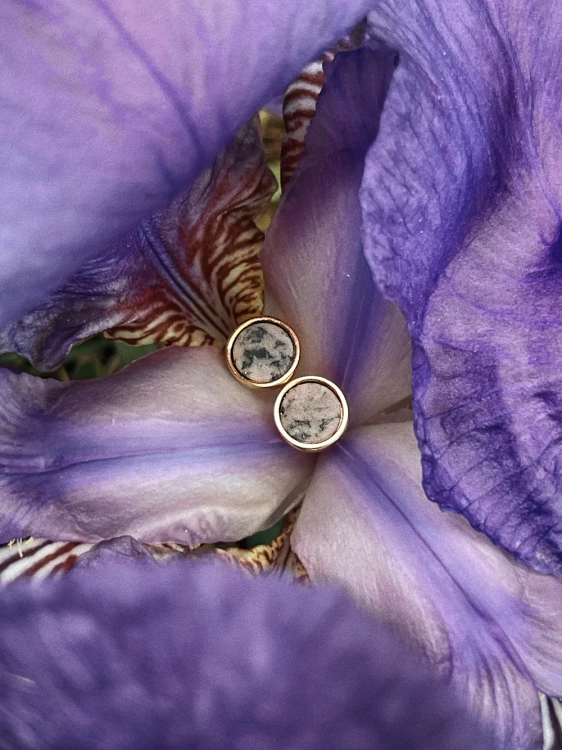 Gold stud earrings with soft pink stone
