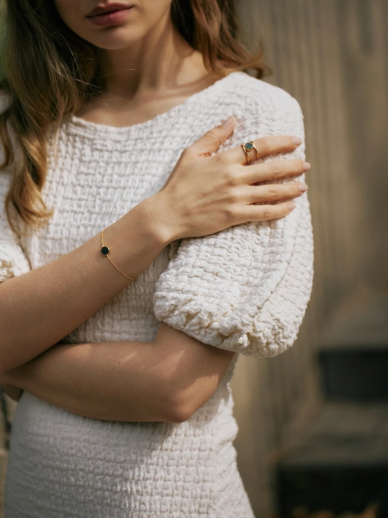 Minimalist gold plated bracelet with green gemstone accent