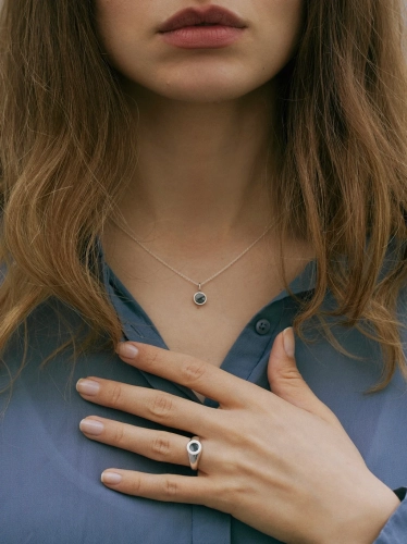 Sterling silver chain with delicate stone pendant