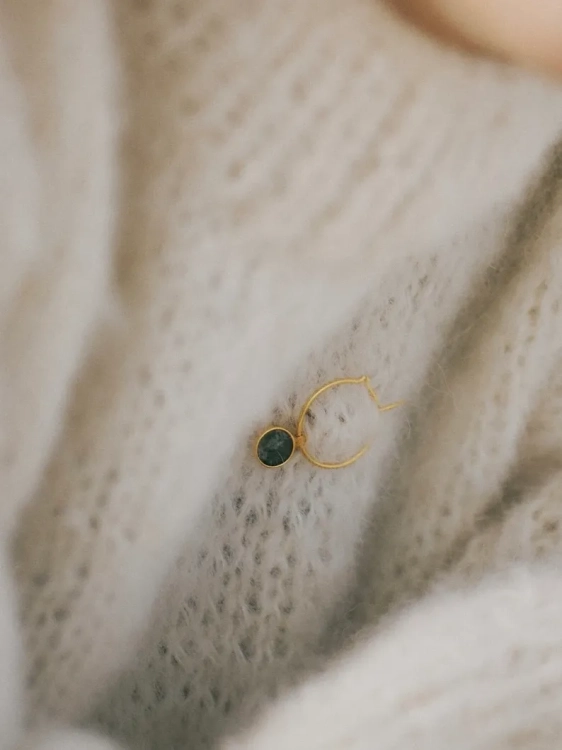 Handmade gold with green stone and circle