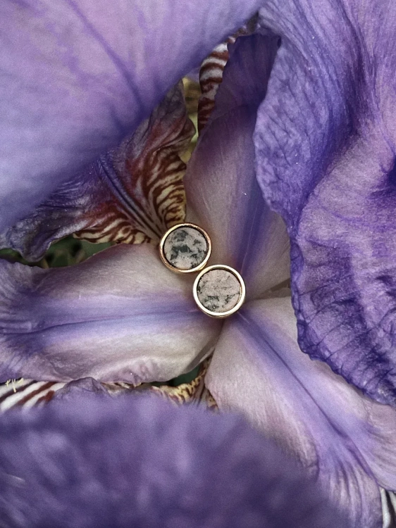 Gold stud earrings with soft pink stone